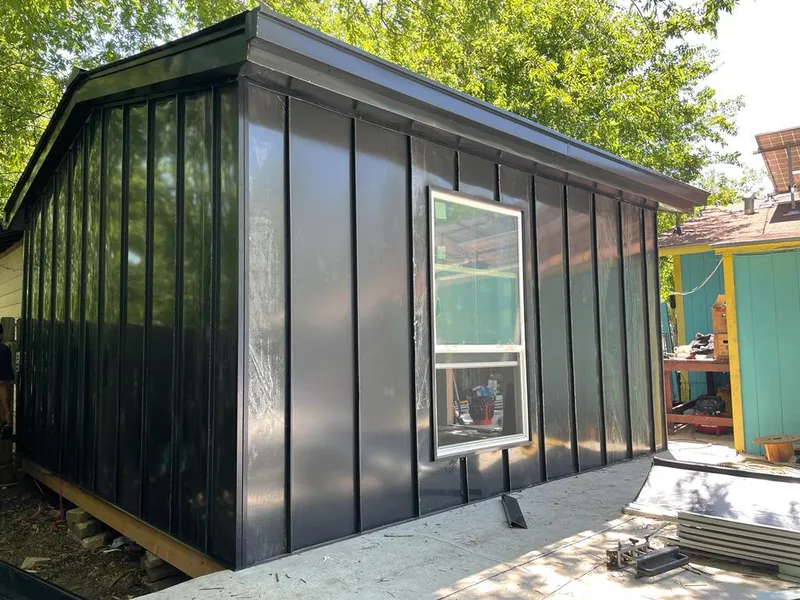 Black standing seam metal wall panels for Roof Inspection in Medford